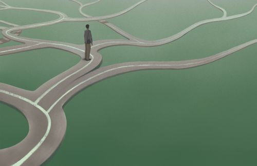 a figure standing at a crossroads