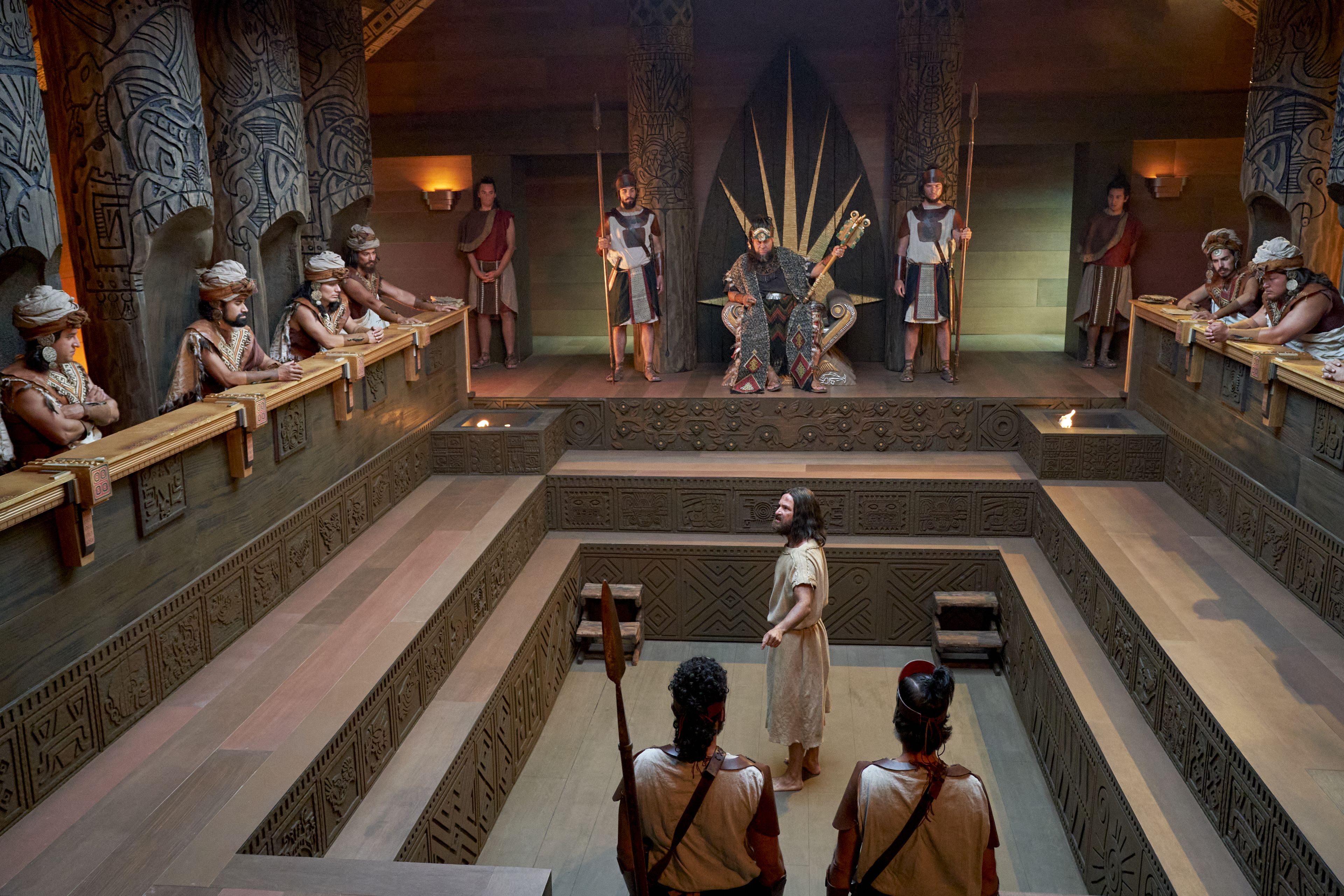 Abinadi is questioned by priests before King Noah.
