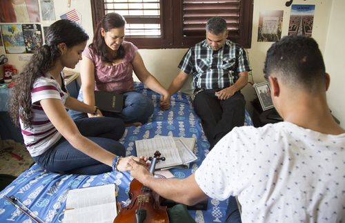 family praying