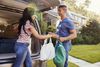 Couple unloading groceries