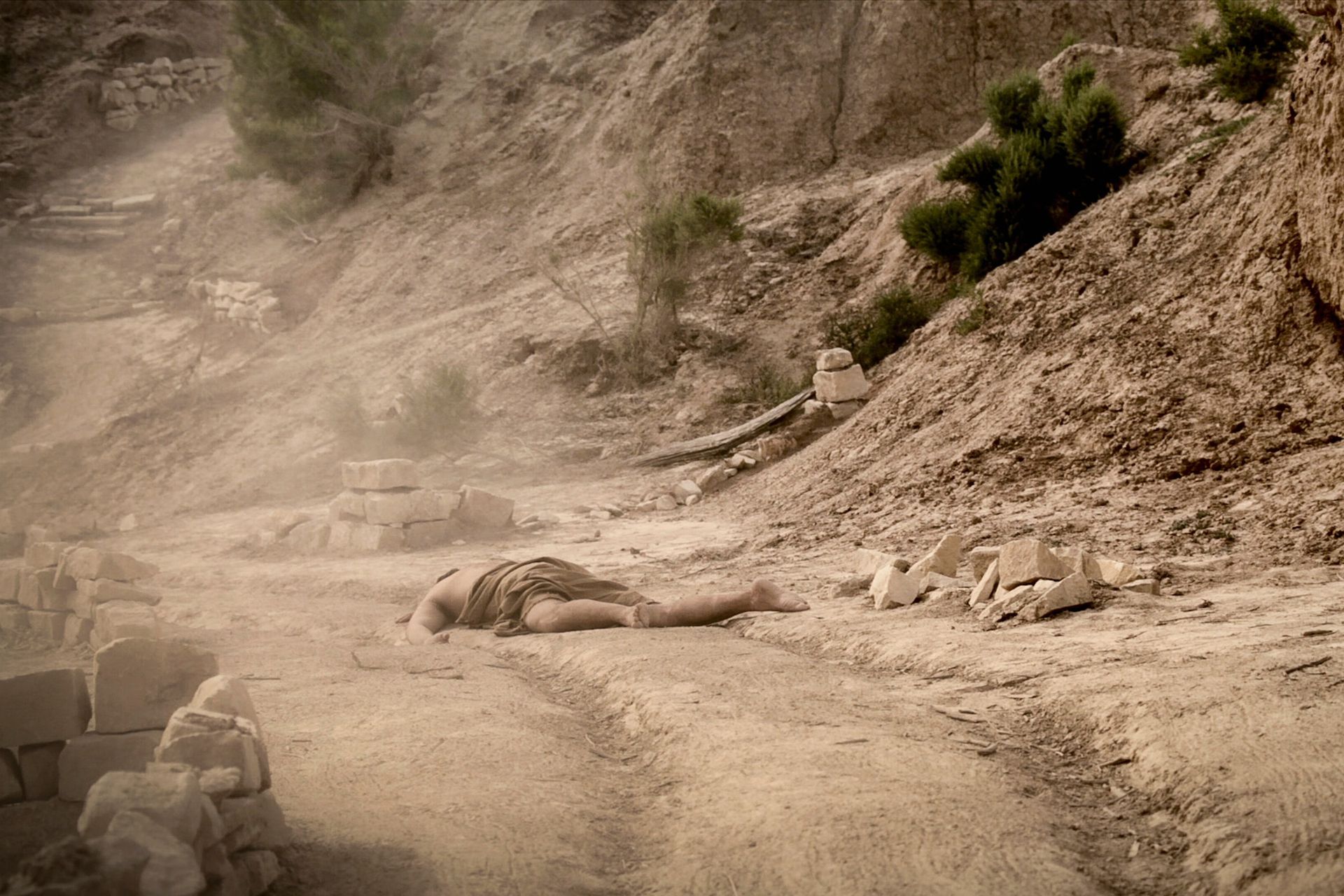 A man on the road to Jericho after being robbed.