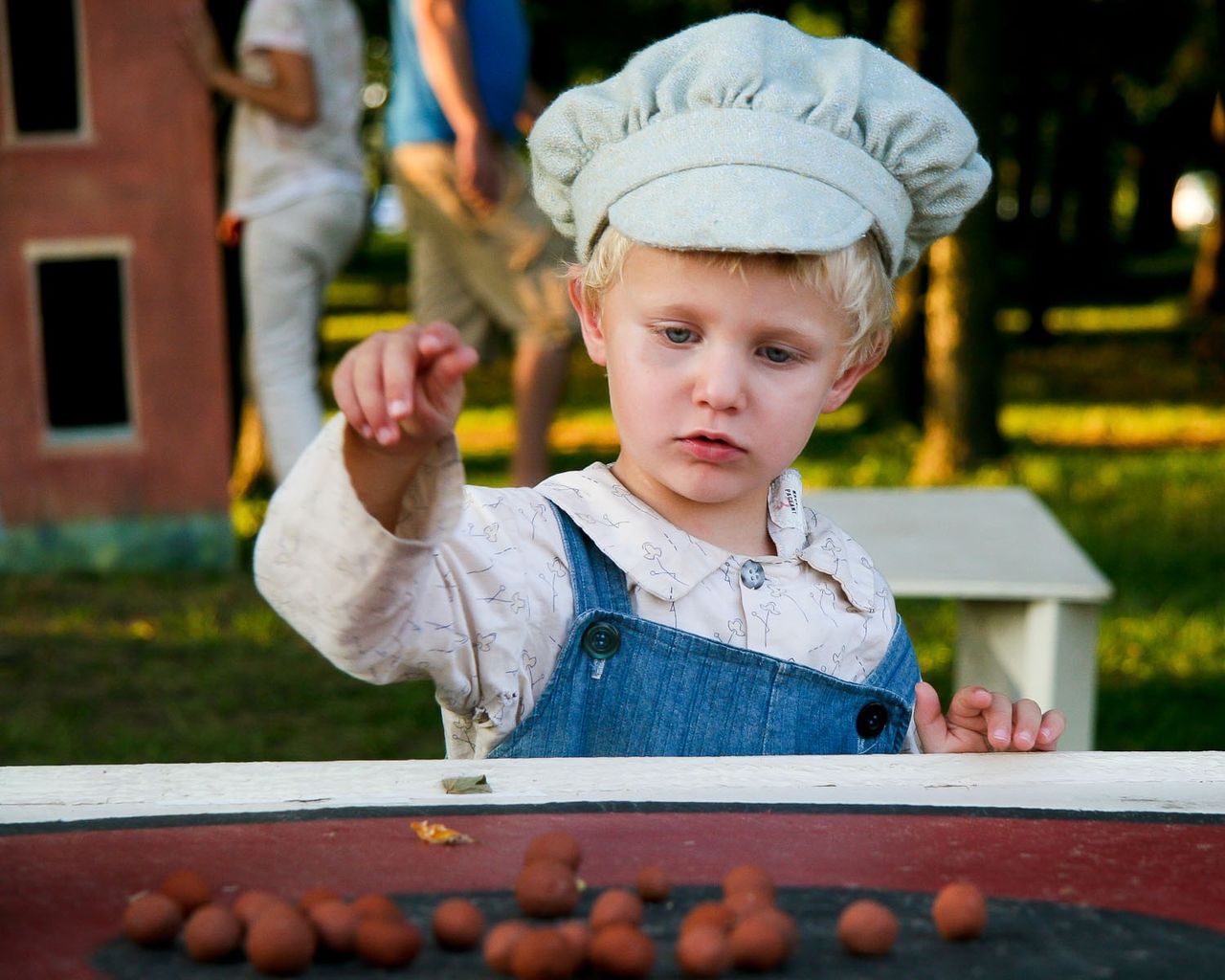 A young actor from the Nauvoo Pageant playing a game.