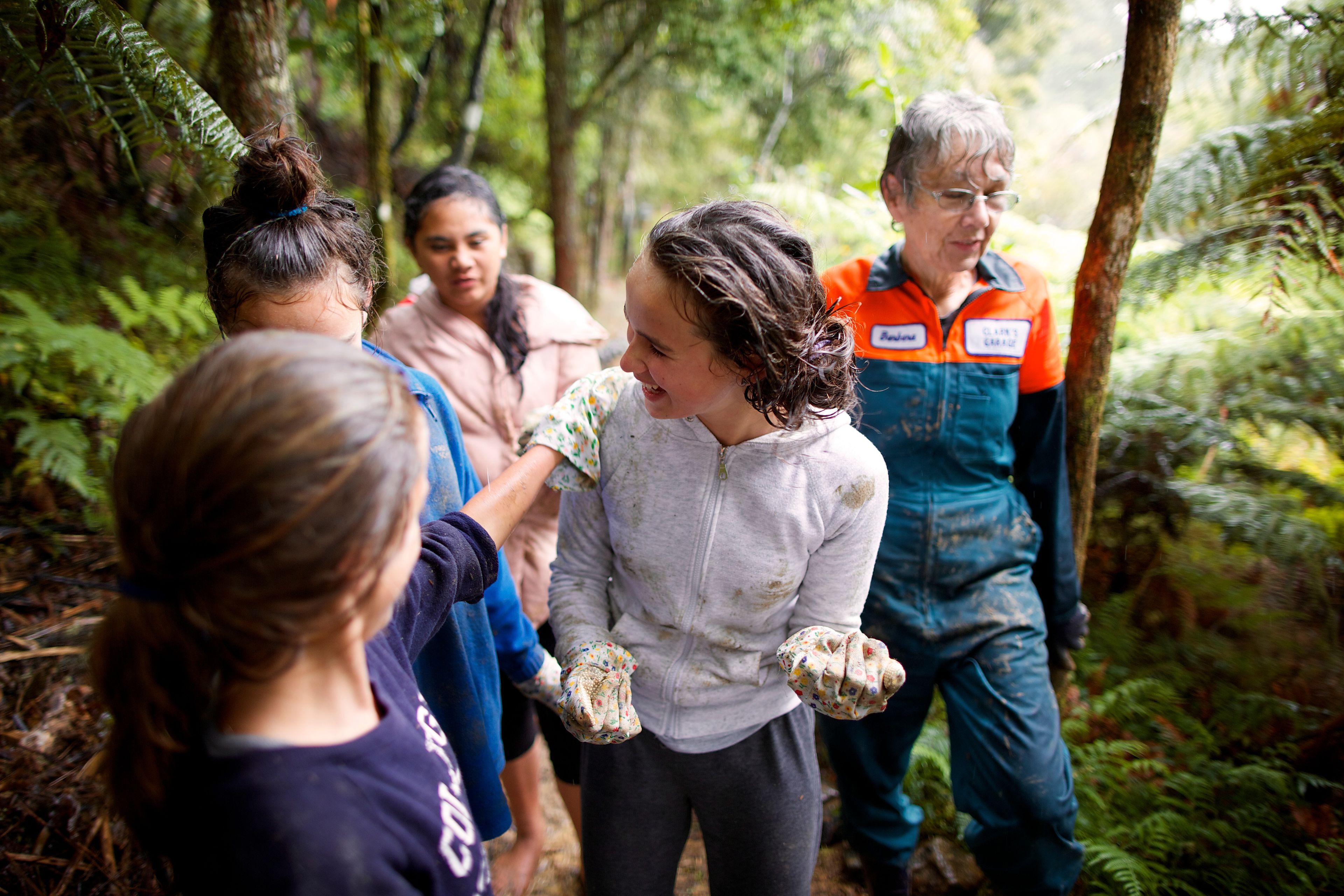 A group of young women in Australia serving together.  