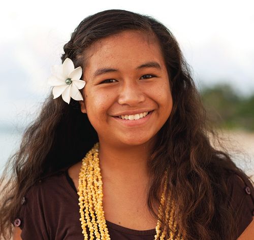 girl smiling on beach