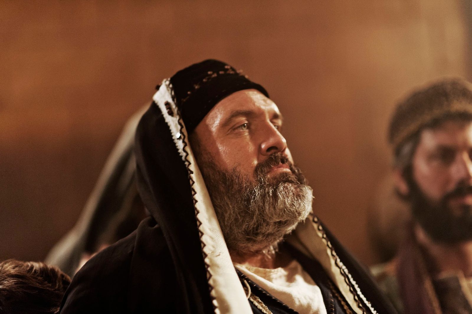 Caiaphas judges Christ.