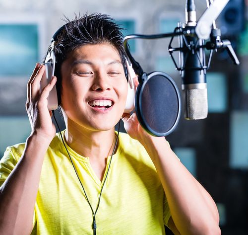 man singing in recording studio