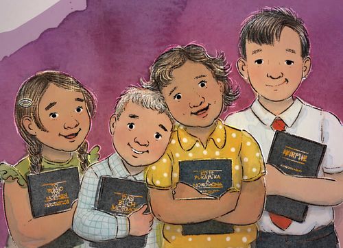 children holding scriptures in different languages