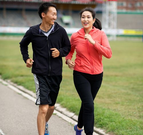 man and woman running