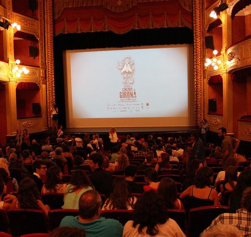 people sitting in a theater