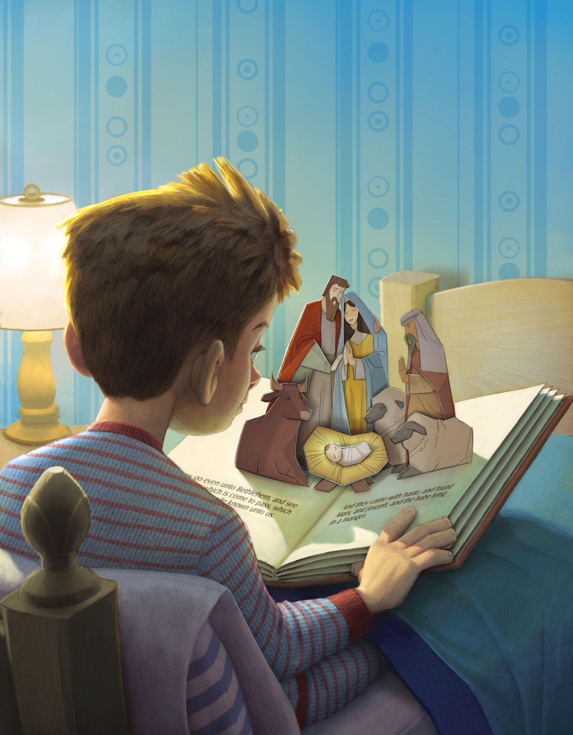 A boy sits up in his bed and reads a pop-up book about the Nativity.
