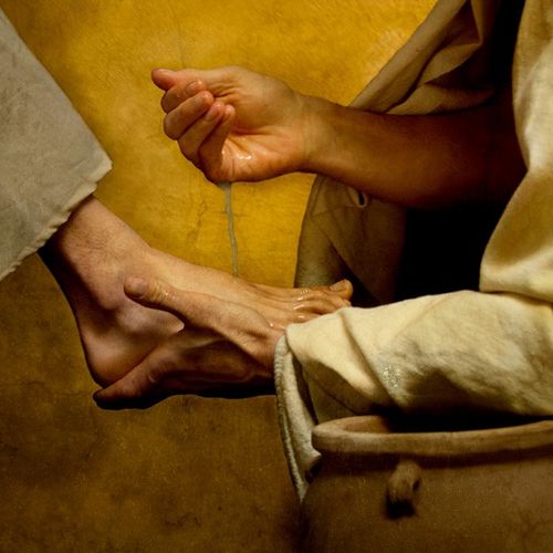 Jesus washing the feet of one of the Apostles