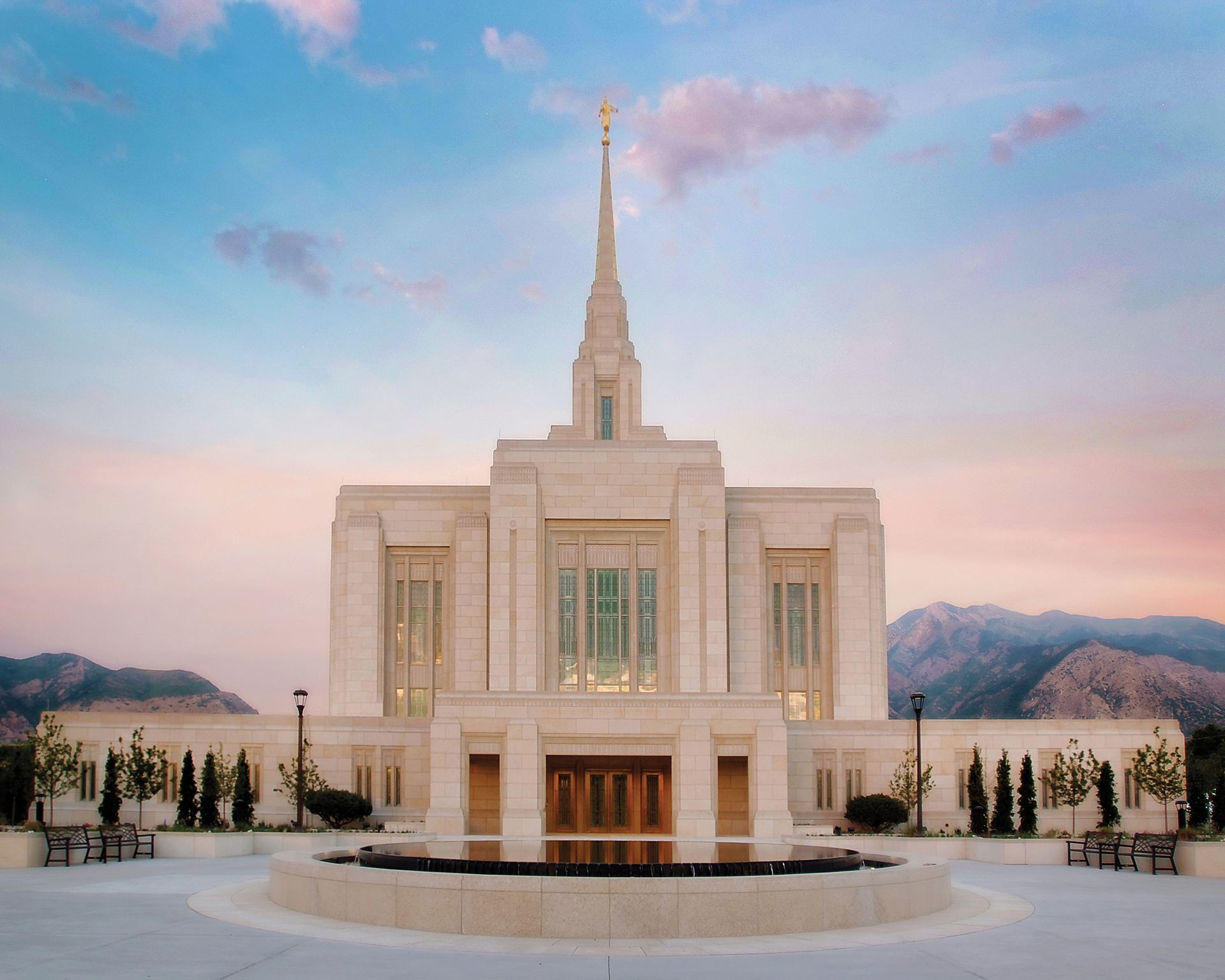 The Ogden Utah Temple, including the entrance, reflection pond, and scenery.