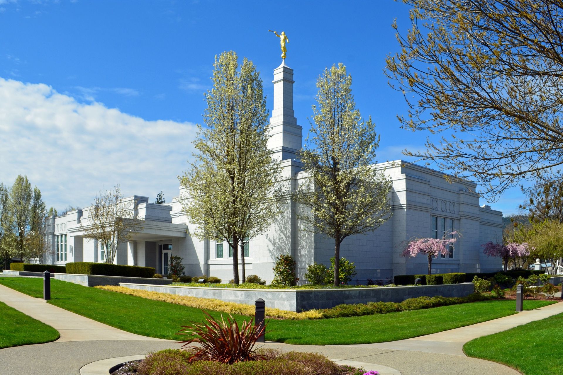 The Medford Oregon Temple side view, including scenery and entrance.