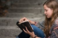 teen studying the scriptures