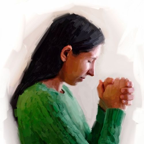 kvinne som ber