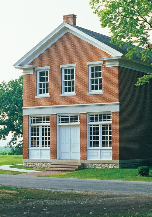 exterior view of two-story red brick building