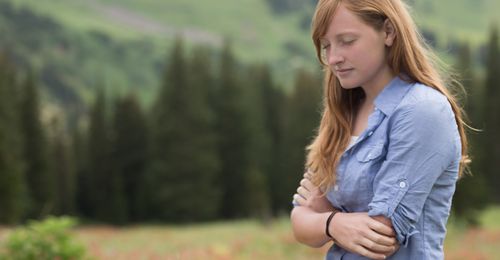 young woman praying