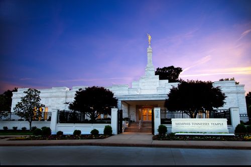 The Memphis Tennessee Temple name sign at sunset.