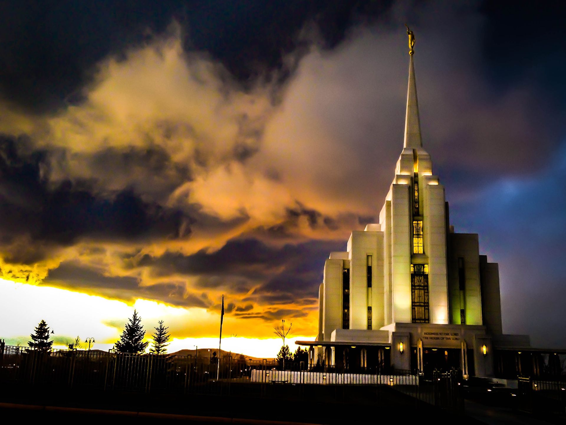 The Rexburg Idaho Temple at sunset, including the entrance and scenery.