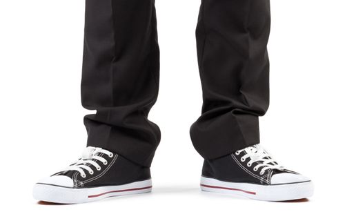dark trousers and sneakers