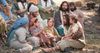 Jesus sitzt bei den Kindern