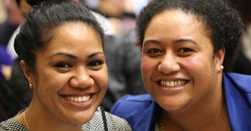 two women smiling