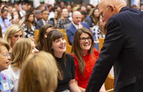 President Oaks visiting with young adults