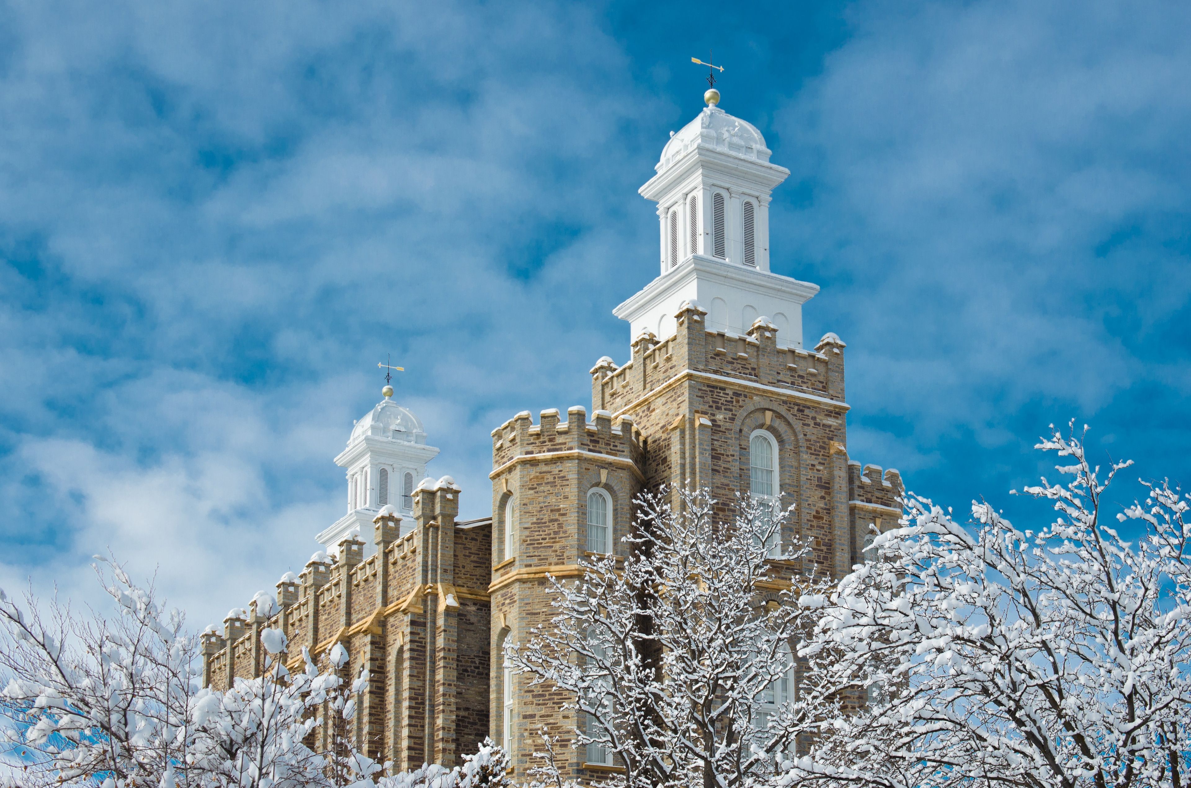 The Logan Utah Temple in the winter, including spires and exterior of temple.