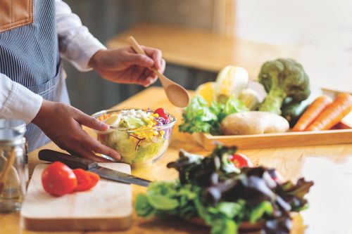 person making a salad