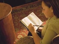 young woman marking scriptures