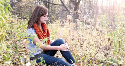 Young woman pondering.