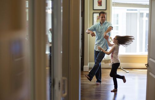 Father and daughter dancing