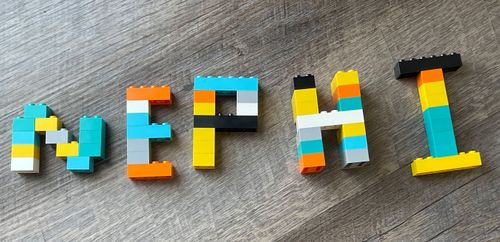 The word ‘Nephi’ spelled out in English with plastic bricks