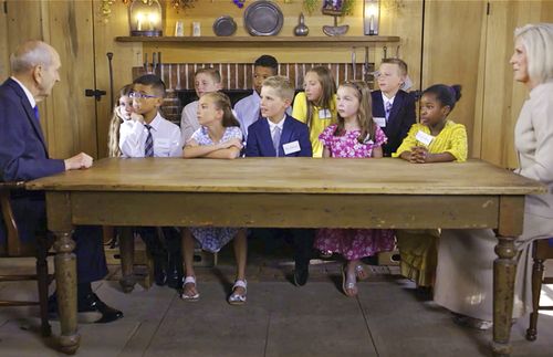President Nelson talking with children