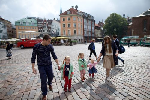 family walking together in city