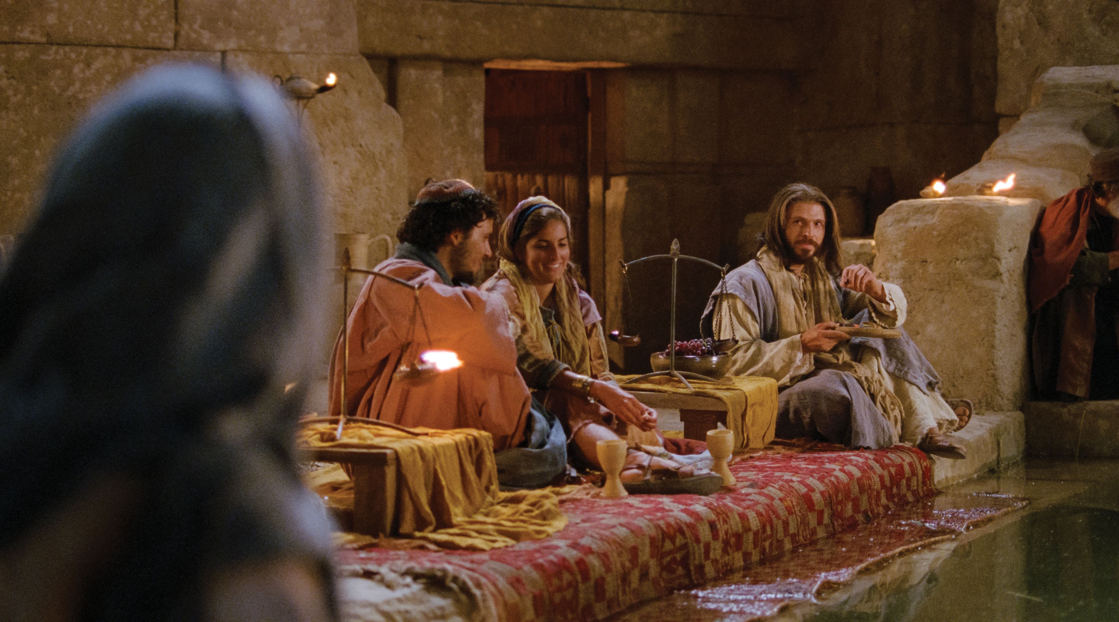 Jesus sits at the wedding feast.