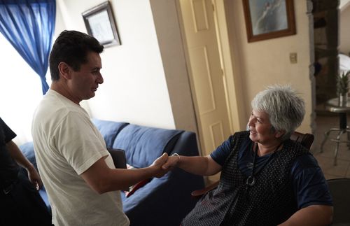 man and woman shaking hands