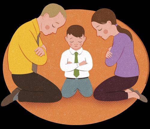 Little boy praying with parents
