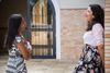 two women talking at church