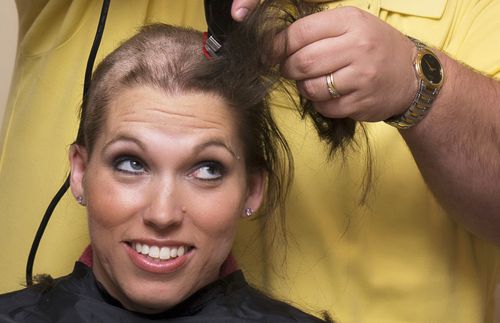 woman getting haircut