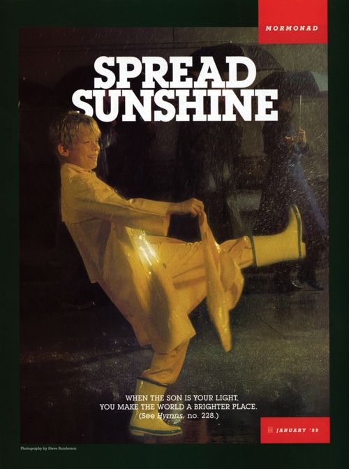 A conceptual photograph of a boy in a yellow raincoat and rain boots dancing on a rainy street, paired with the words “Spread Sunshine.”