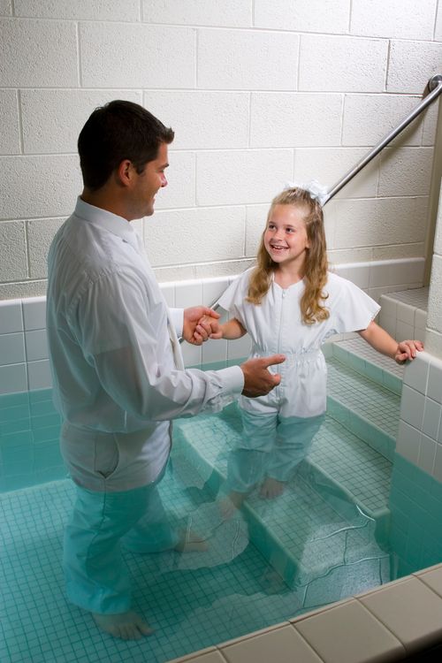 Entering the Baptismal Font