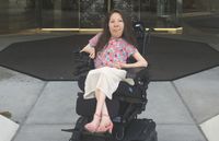 young adult woman in wheelchair