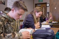 youth studying the scriptures