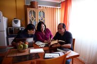 family studying the scriptures together