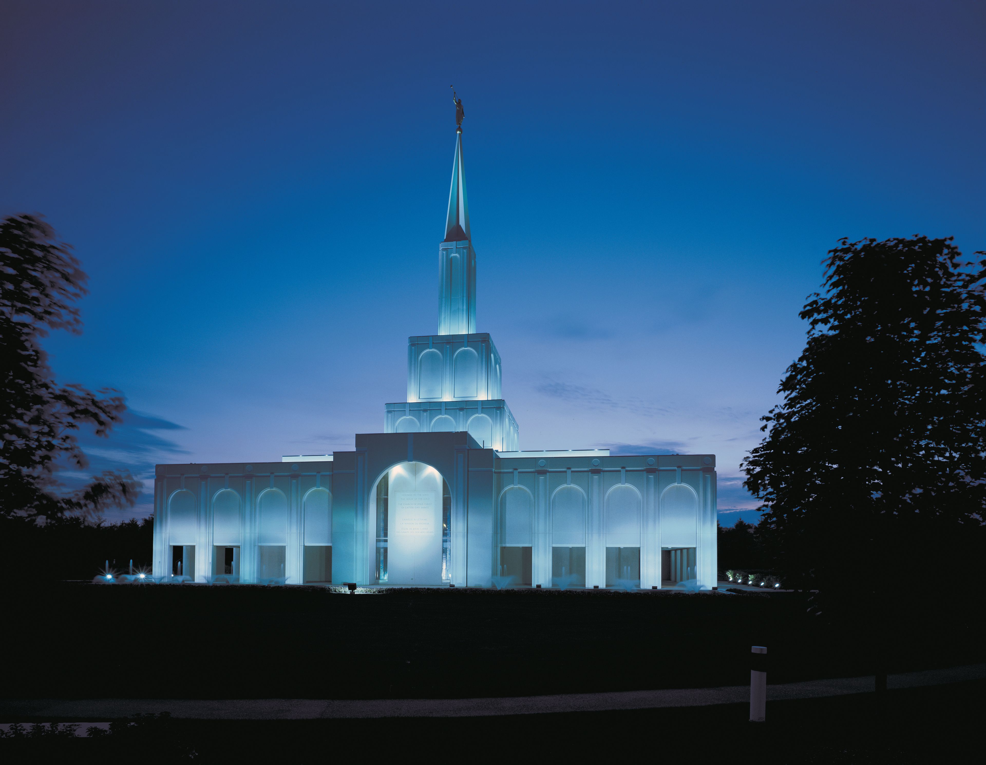 The Toronto Ontario Temple in the evening, including the entrance and scenery.