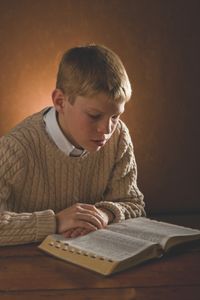 youth studying scriptures