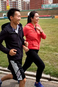 young adults jogging