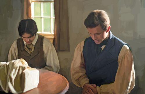 Joseph Smith and Oliver Cowdery bow their heads and pray before translating the Gold Plates.