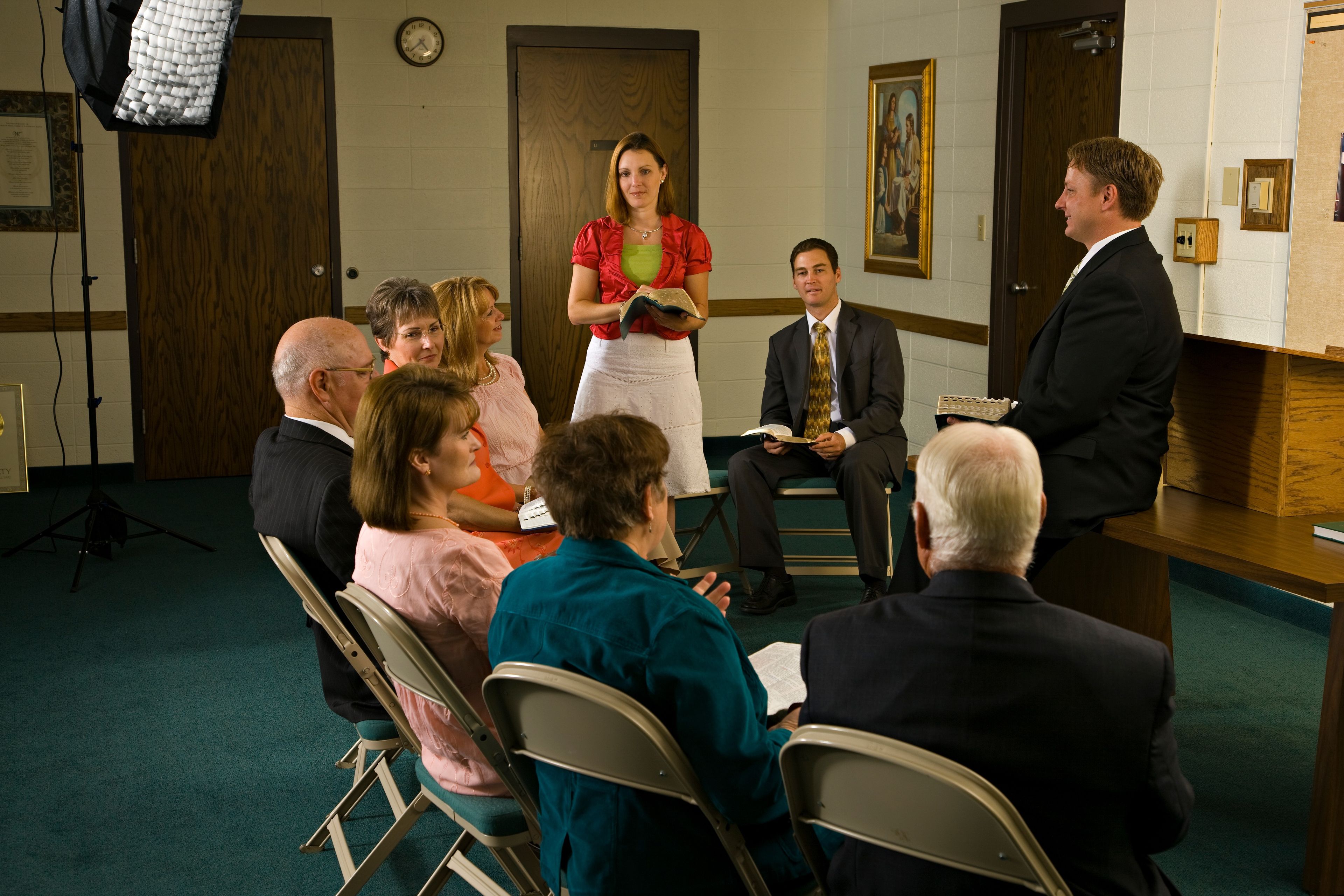Adults sitting in a circle in Sunday School.